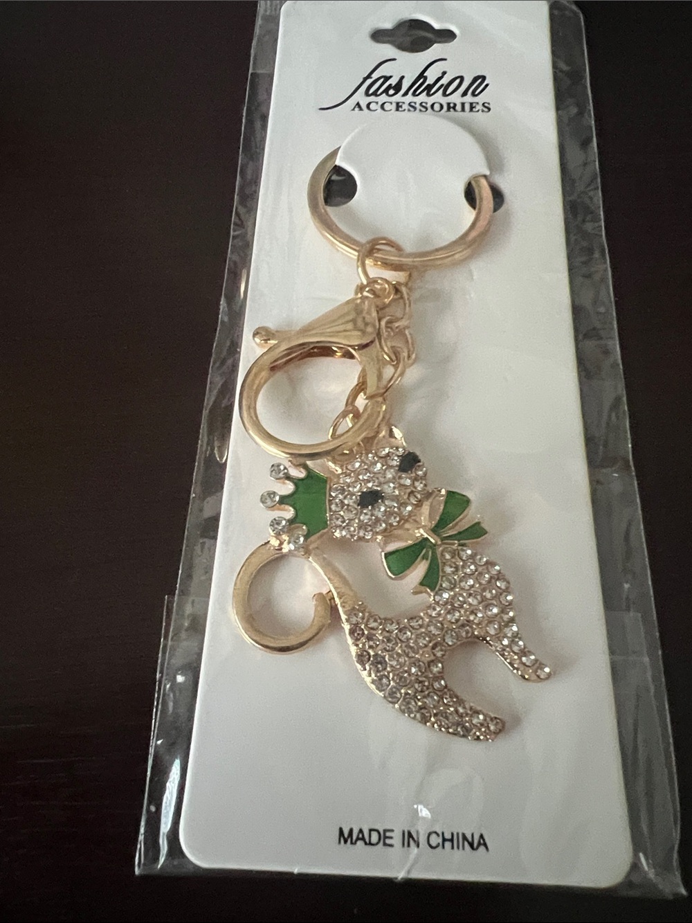 Gold-Tone Crystal Cat Keychain with Green Bow by